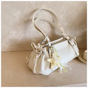 Chic white pleated shoulder bag for women, stylish underarm tote with cute star charm.