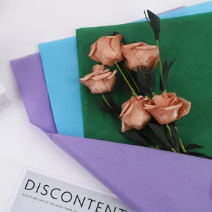 Colorful tissue wrapping paper detail shot, perfect for floral bouquets and gift box packaging.