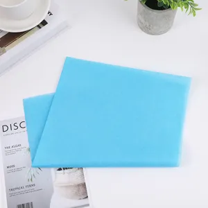 Light blue tissue paper detail shot, perfect for gift boxes, shoes and floral packaging.