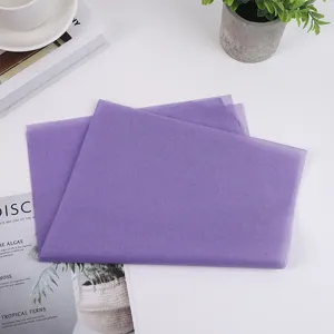 Purple tissue paper for gift wrapping, floral packaging, and shoe boxes. Detail shot.