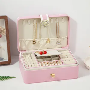 Pink PU leather double layer jewelry box with lock for rings, earrings and necklaces.