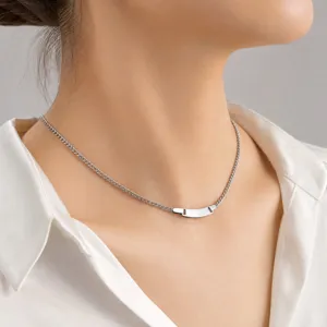 Stainless steel curb chain necklace with curved blank bar pendant, minimalist fashion jewelry.
