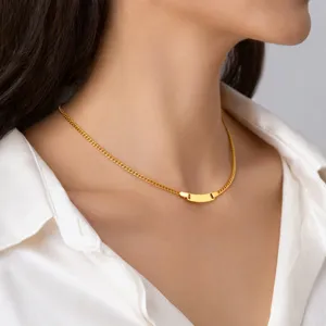 Close-up view of the stainless steel curved plate chain necklace, elegant and modern.