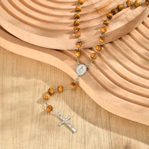 Retro wooden bead rosary necklace with alloy crucifix pendant for women fashion accessory detail view.