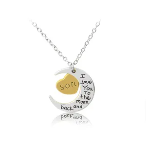 Crescent moon and heart pendant necklace with love engraving for women fashion jewelry detail.