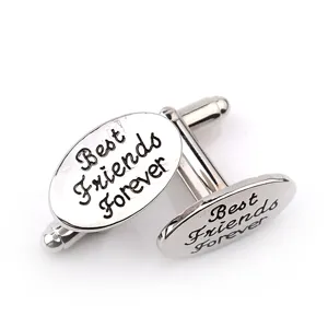 Boutons de manchette ovales en argent gravés d'un message d'amitié pour homme mode.