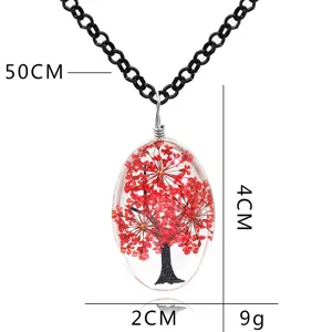 Dettaglio collana albero fiori secchi artigianale, pendente resina ovale 4x2cm, catena 50cm.