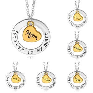 Silver circle and gold heart pendant necklace featuring family love engraving for women.