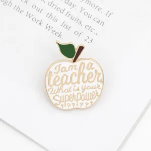 Teacher enamel apple pin brooch with inspiring quote, creative metal collar jewelry gift.
