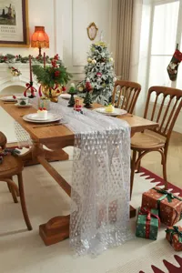 White mesh Christmas tree silver stamped table runner for holiday dining decor and party.