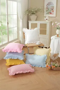 French pastoral cotton ruffle checkered throw pillow cushion cover detail view in cozy room