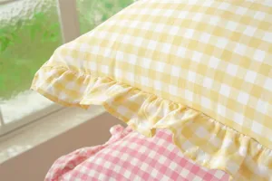 French pastoral checkered throw pillow cover with cute ruffles cotton material detail view.