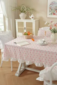 Tovaglia rettangolare in cotone jacquard con stampa fiocco e gonna con volant per tavolo da pranzo.