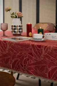Red gold jacquard leaf tablecloth festive dining table cover with elegant lace border trim.