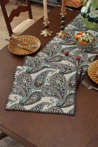 American vintage paisley yarn-dyed jacquard table runner and placemat set with neat edges.
