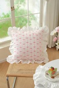 French style cotton printed bow pillow cushion with ruffles for sofa bed decor detail shot.