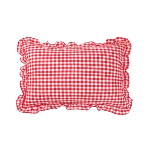 Detailed view of red and white checkered throw pillow with ruffled frill edge, pastoral style.