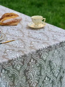 French vintage lace tablecloth for outdoor dining table, elegant floral fabric decoration.