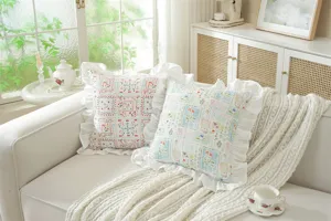 Detailed view of French style ruffled floral print cotton throw pillow cover for cozy home decor