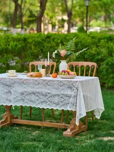 French vintage outdoor white lace tablecloth detail for wedding party decoration setup