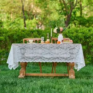 Outdoor French vintage white lace tablecloth for dining table wedding party home decor detail view.