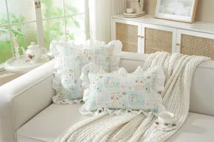 French style floral print cotton decorative throw pillow with delicate ruffled edge detail.
