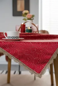 Red gold jacquard tablecloth festive dining table cover with elegant lace fringe border detail
