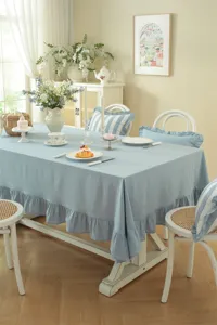Belle nappe de table style pastoral français en coton lavé pur avec bord volanté.