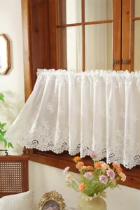 Detailed view of French white embroidered hollow lace short cafe curtain for vintage home decor.