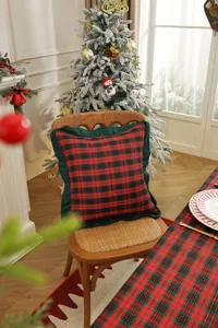 Christmas red and green plaid pillow cover with ruffled edge for holiday home decor.