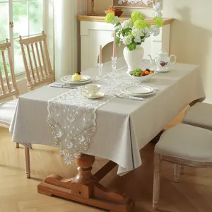 Elegant white and gold star moon lace table runner and tablecloth set for dining room decor.