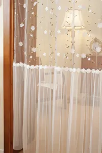 French style embroidered lace door curtain with delicate floral patterns for room partition.