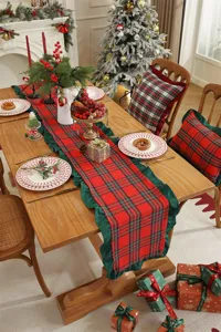 Christmas table runner red plaid tartan holiday dining table decor with ruffled edge.