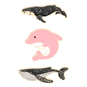 Cute cartoon marine animal enamel brooch set featuring whale and dolphin designs for apparel.