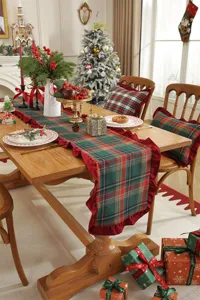 Christmas plaid table runner with ruffles, red and green festive holiday home decor.