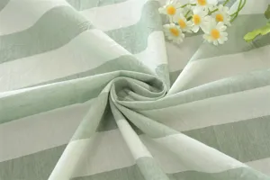 Détail de tissu en coton rayé vert et blanc, texture de nappe de style pastoral français