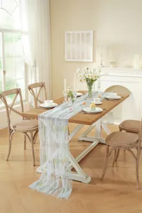 Elegant lace table runner with colorful floral embroidery, pleated mesh design for wedding decor.