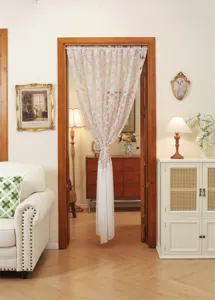 Detailed view of the French style double-layer embroidered lace door curtain with hanging beads.