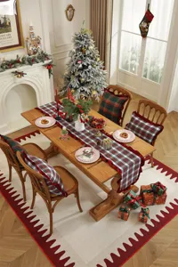 Detailed view of the Christmas table runner with classic plaid pattern and ruffled edges.