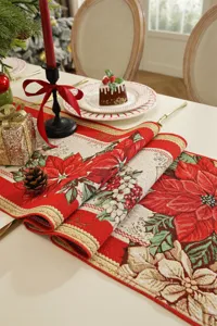 Nahaufnahme des Weihnachts-Tischläufers mit rotem Weihnachtsstern-Jacquardmuster.
