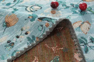 Détail de nappe florale jacquard vintage américaine, tissu en coton polyester bleu.