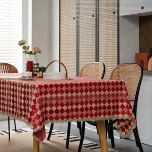 Red diamond pattern tablecloth with gold lace trim for wedding holiday dining table decor.