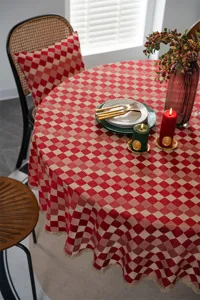Red checkered round tablecloth with elegant gold lace trim for wedding holiday dining table decor.