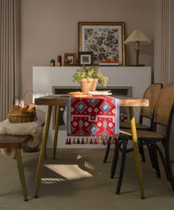 Detailed view of the modern minimalist polyester jacquard geometric red festive table runner.