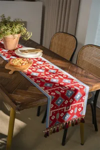 Modern red geometric jacquard table runner with tassels, polyester dining table decor cloth.