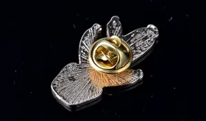 Close-up detail view of the metal cactus brooch back, showing secure metal clutch pin clasp.