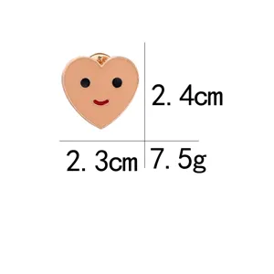 Cute enamel heart brooch with smiling face, compact size 2.4x2.3cm, fashion lapel pin.