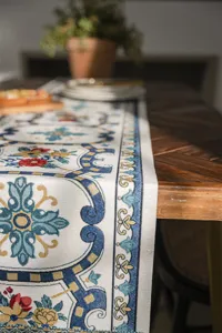 Detailed view of jacquard table runner featuring elegant vintage floral patterns for dining decor.