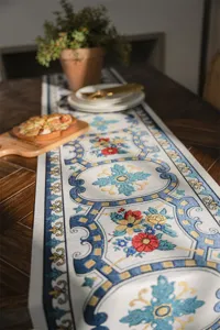 Detailed view of European classical jacquard table runner with blue and red floral patterns.