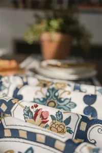 Detailed view of modern minimalist polyester jacquard table runner with geometric floral pattern.